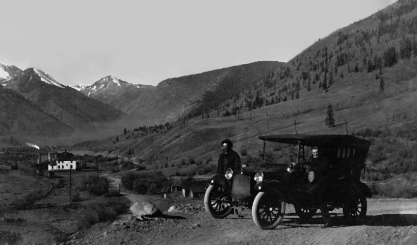 Silverton Northern Caboose 1005 on siding next to Animas Power & Light about 1920.